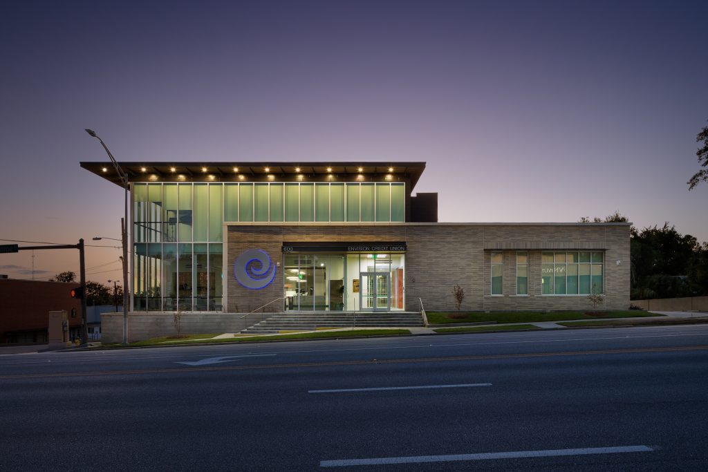 A dusk view of Envision Credit Union at 600 N.Monroe from across the street
