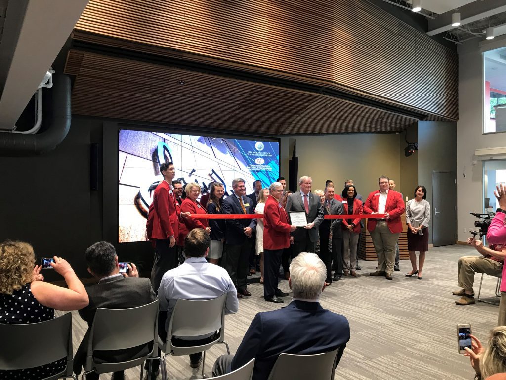Ribbon-cutting ceremony at the Jim Moran Building.